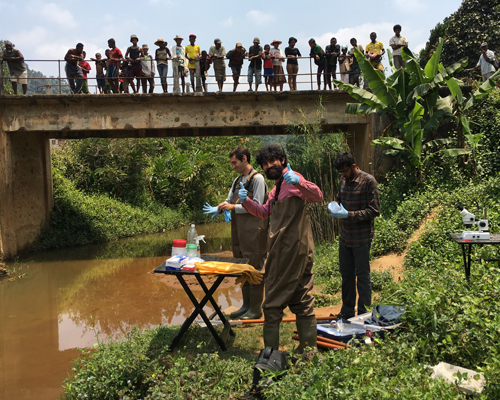 Photo of Manu Prakash and Deepak Krishnamurthy with a local co-worker in Madagascar.
