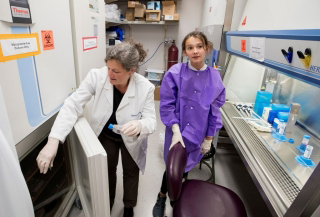 Photo of Kendall Kemm and Lorelei Shoemaker working on an experiment.