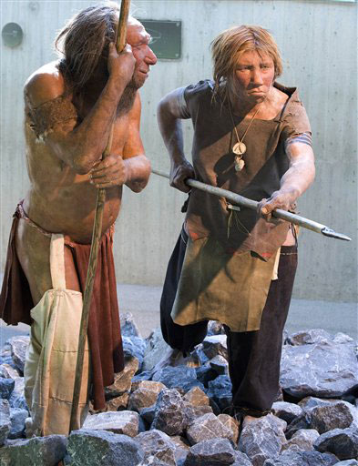 Museum recreation of neanderthals.