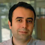 Headshot portrait of Amin Saberi - Associate Professor of Management Science and Engineering and (by courtesy) of Electrical Engineering