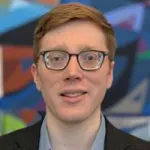 Photo of smiling white male faculty member, Dr. Andrew Mannix, Assistant Professor of Materials Science & Engineering at Stanford.