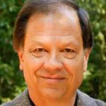 Headshot photo of Dr. Bill Newsome, director of the Wu Tsai Neurosciences Institute and Professor of Neurobiology