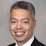 Photo of smiling Asian faculty member. Dr. Billy Loo, Professor of Radiation Oncology at Stanford University.