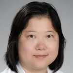 Photo of smiling female Asian faculty member Dr. Bo Yu, Associate Professor of Obstetricss & Gynecology at Stanford University.