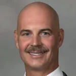 Headshot portrait of Mark Buyyounouski - Professor of Radiation Oncology (Radiation Therapy) at Stanford University
