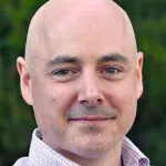Photo of Dr. Christopher Re, Associate Professor of Computer Science at Stanford University.