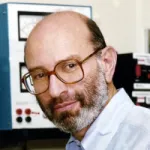 Headshot portrait of Stanley Cohen - Kwoh-Ting Li Professor in the School of Medicine and Professor of Genetics and of Medicine