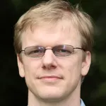 Headshot portrait of Doug James - Professor of Computer Science and (by courtesy) of Music
