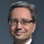 Headshot portrait of Gregory Enns - Professor of Pediatrics (Genetics)