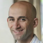 Photo of Dr. Eran Bendavid, Associate Professor of Medicine at Stanford University.