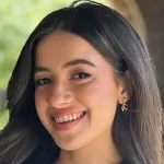 Headshot portrait of Andrea Flores Perez - Bruce and Elizabeth Dunlevie Fellow