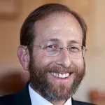 Headshot portrait of Alan Garber - Henry J. Kaiser Jr. Professor and Professor of Medicine, Emeritus