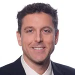 Photo of smiling white male faculty member, Dr. Geoffrey Abrams, Associate Professor of Orthopaedic Surgery at Stanford University.