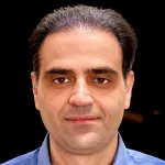 Headshot portrait of Hadi Hosseini - Associate Professor (Research) of Psychiatry & Behavioral Sciences (Interdisciplinary Brain Science Research)