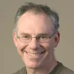 Headshot portrait of Daniel Herschlag - Professor of Biochemistry and (by courtesy) of Chemical Engineering