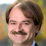 Headshot portrait of John Ioannidis - Professor of Medicine (Stanford Prevention Research Center), of Epidemiology & Population Health and (by courtesy) of Biomedical Data Science