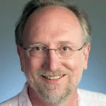 Headshot portrait of James Ferrell - Professor of Chemical and Systems Biology and of Biochemistry