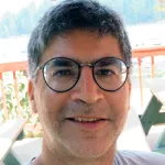 Headshot portrait of Shamit Kachru - Professor of Physics and Director of the Stanford Institute for Theoretical Physics