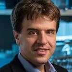 Headshot portrait of Karl Deisseroth - D. H. Chen Professor and Professor of Bioengineering and of Psychiatry & of Behavioral Sciences
