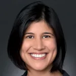 Photo of smiling female faculty member, Dr. Kavita Yang Sarin, Associate Professor of Dermatology at Stanford University.