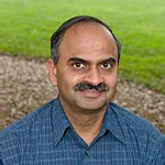 Headshot portrait of Sanjiva Lele - Professor of Aeronautics and Astronautics and of Mechanical Engineering