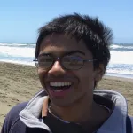 Headshot portrait of Aditya Mahadevan - Bio-X Travel Awardee