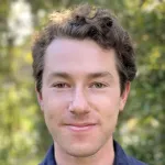 Photo of smiling male undergraduate student Benjamin Midler.