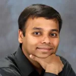 Headshot portrait of Subhasish Mitra - Associate Professor of Electrical Engineering and of Computer Science