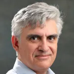 Headshot portrait of Nicholas Bambos - Richard W. Weiland Professor in the School of Engineering and Professor of Electrical Engineering