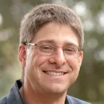 Headshot portrait of Noah Rosenberg - Stanford Professor of Population Genetics and Society