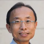 Headshot portrait of H.-S. Philip Wong - Willard R. and Inez Kerr Bell Professor in the School of Engineering and Professor of Electrical Engineering
