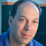 Headshot portrait of Stephen Quake - Lee Otterson Professor in the School of Engineering and Professor of Bioengineering, of Applied Physics, and (by courtesy) of Physics