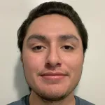 Photo of smiling male undergraduate student Michael Spear.