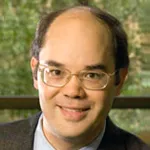 Headshot portrait of Steven Chang - Robert C. and Jeannette Powell Neurosciences Professor and Professor of Neurosurgery