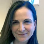 Headshot portrait of Suzanne Tharin - Assistant Professor of Neurosurgery