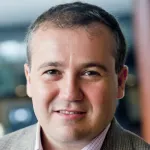 Headshot portrait of Utkan Demirci - Professor of Radiology and (by courtesy) of Electrical Engineering