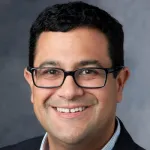 Headshot portrait of Tulio Valdez - Associate Professor of Otolaryngology (Pediatric)