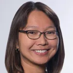 Indoor headshot photo of a smiling female faculty member, Dr. Valerie Chock, Professor of Pediatrics at Stanford University.
