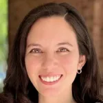 Outdoor headshot photo of a smiling white female faculty member, Dr. Vivian Feig, Assistant Professor of Mechanical Engineering at Stanford University.