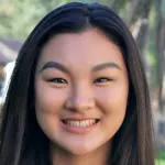 Photo of smiling female undergraduate student Amberly Vu.