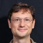 Headshot portrait of Marius Wernig - Professor of Pathology and (by courtesy) of Chemical & Systems Biology