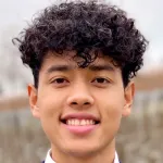 Photo of smiling male undergraduate student Waymon Whiting.