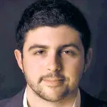 Headshot portrait of Johnny (Yonatan) Israeli - Bruce and Elizabeth Dunlevie Fellow 