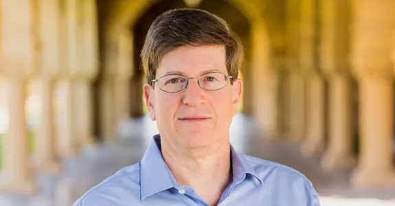 Mark Schnitzer standing outdoors at Stanford