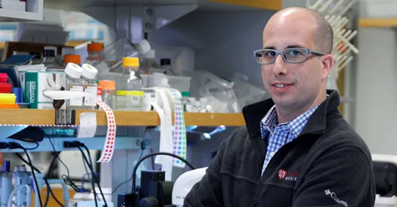 Photo of Dr. Aaron Gitler in the lab.