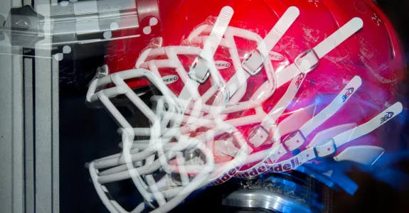 Photo by L.A. Cicero showing helmet undergoing effects of concussion.