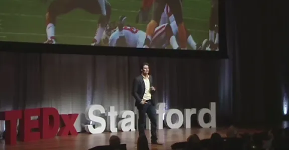 Screenshot of Dr. David Camarillo delivering his talk.