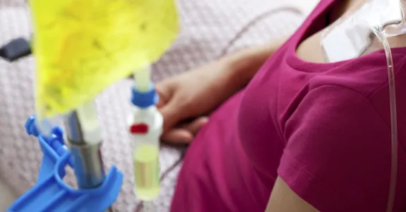Photo of woman receiving chemotherapy.