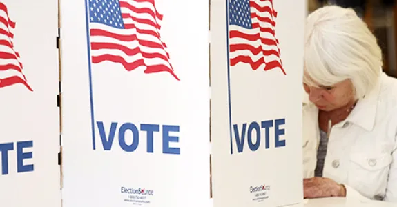 Photo of voter filling out ballot.