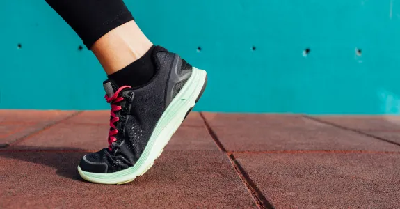 Photo of a person's foot in an athletic shoe.